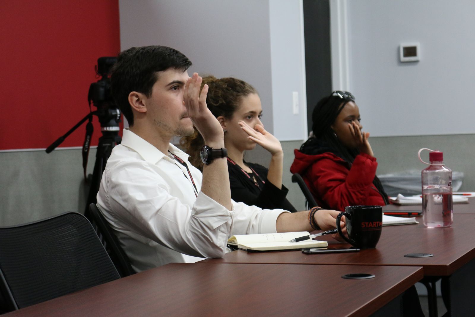 Students participate in a discussion at START