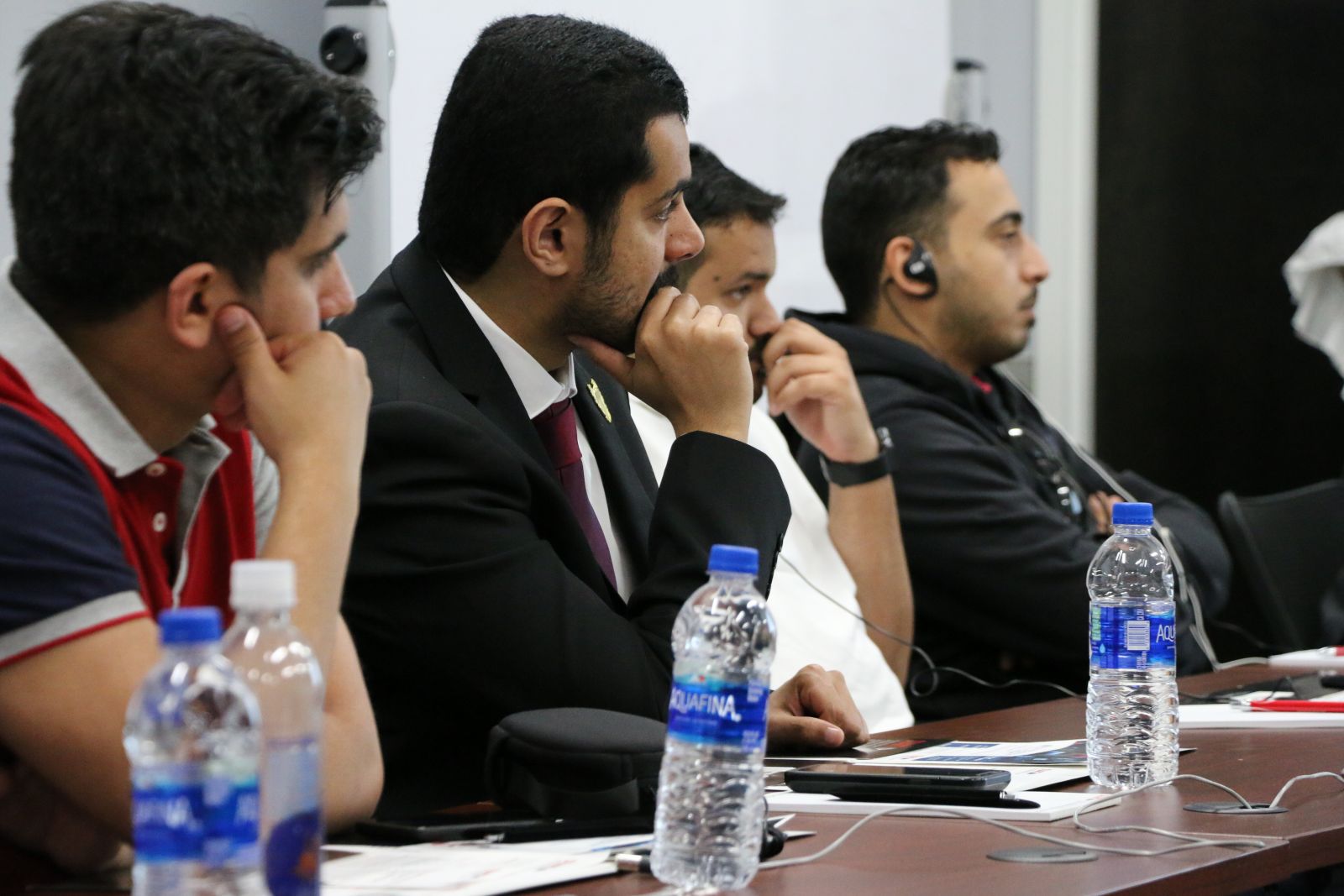 IVLP participants watch a lecture